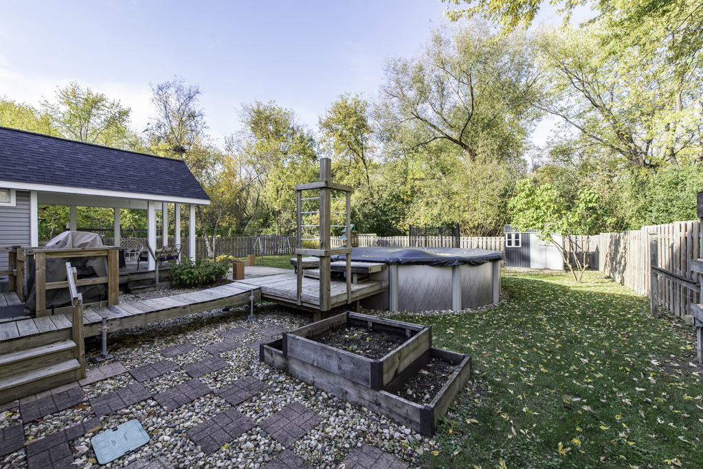 3482 Ellis Avenue Gurnee, IL 60031 - Photo 41 of 46 a view of a backyard with sitting area and furniture