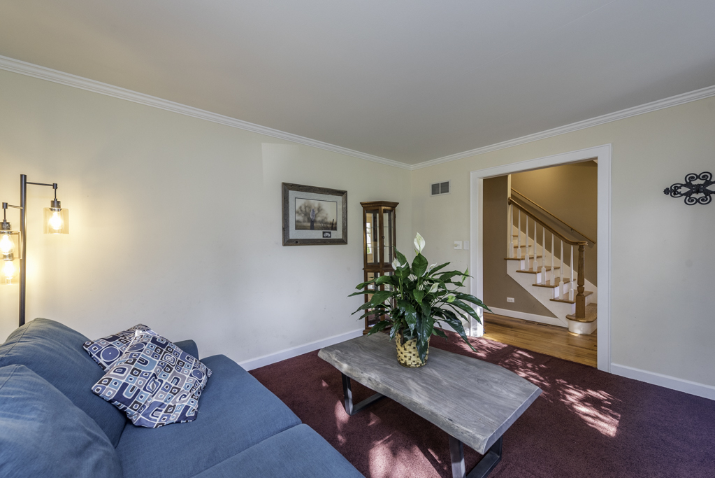 3482 Ellis Avenue Gurnee, IL 60031 - Photo 6 of 46 a living room with furniture and flowers
