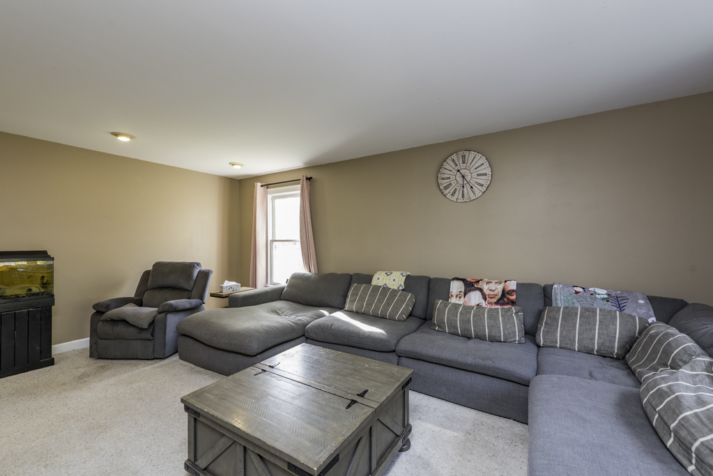 3482 Ellis Avenue Gurnee, IL 60031 - Photo 9 of 46 a living room with furniture and a window