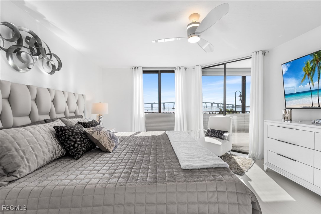 15010 Punta Rassa Road, Unit 106 Fort Myers, FL 33908 - Photo 15 of 36 a living room with furniture