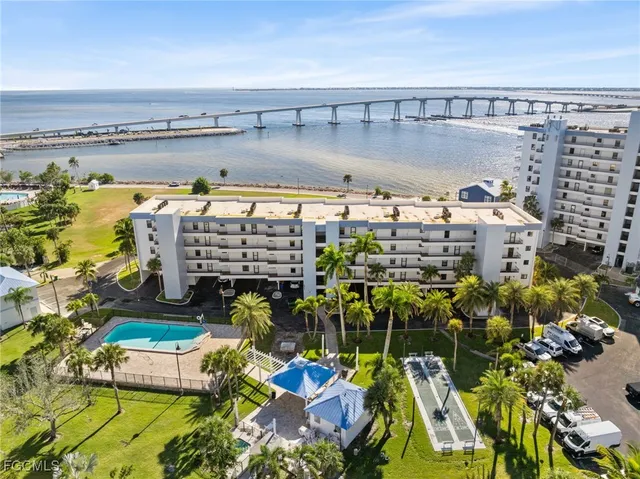 a view of swimming pool with outdoor seating
