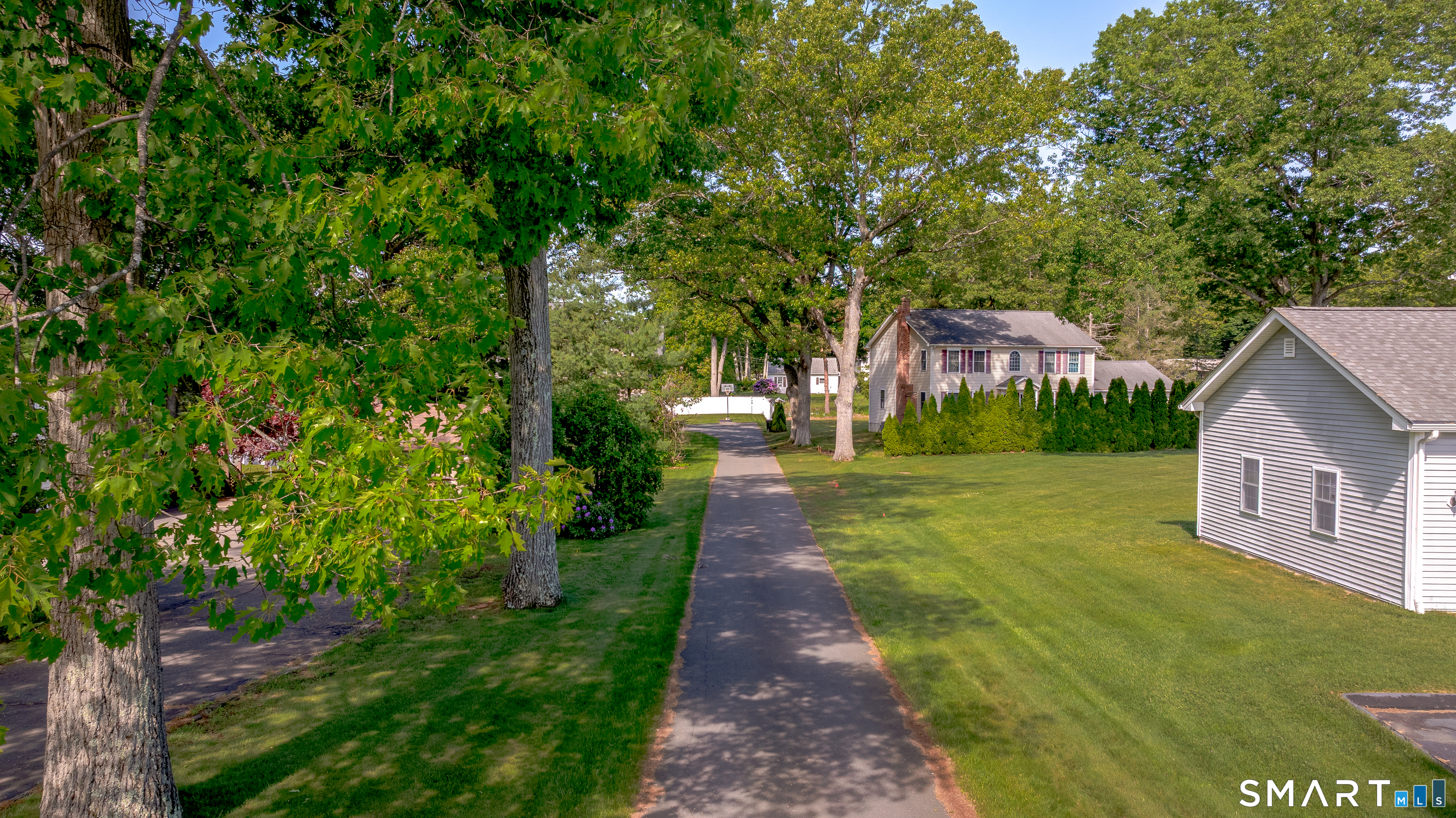 261 Spring Road North Haven, CT 06473 - Photo 6 of 39 a view of a house with a yard