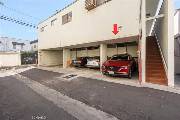 a cars parked in front of a building