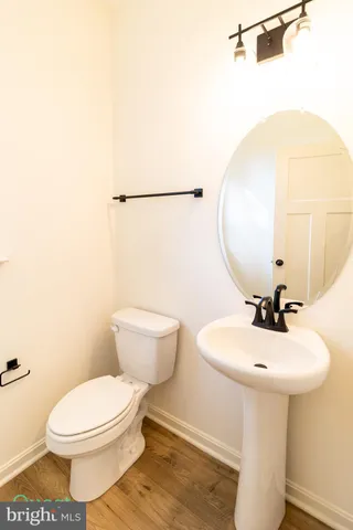 a bathroom with a double vanity sink and mirror
