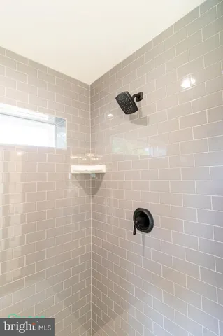 a bathroom with a toilet a sink and bathtub