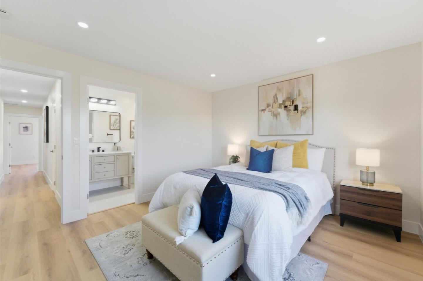 391 Gross Street Milpitas, CA 95035 - Photo 12 of 29 a spacious bedroom with a bed and a couch