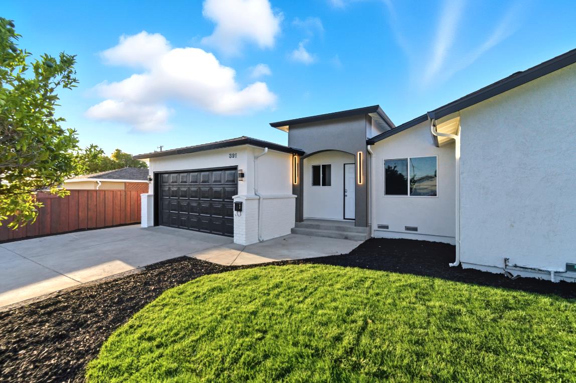 391 Gross Street Milpitas, CA 95035 - Photo 2 of 29 a front view of a house with a yard