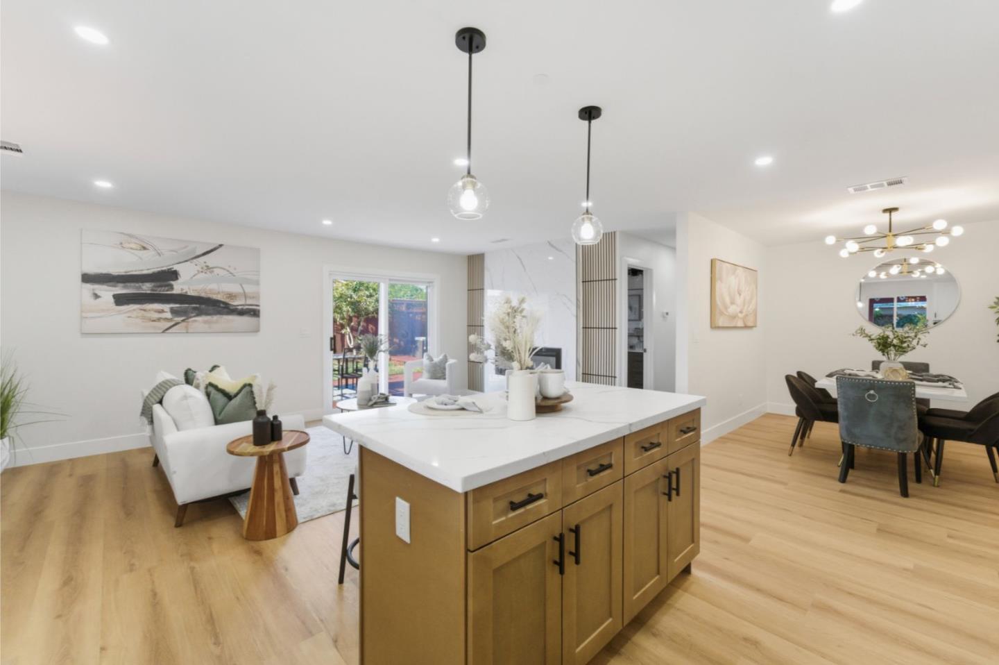 391 Gross Street Milpitas, CA 95035 - Photo 7 of 29 a view of a living room and kitchen