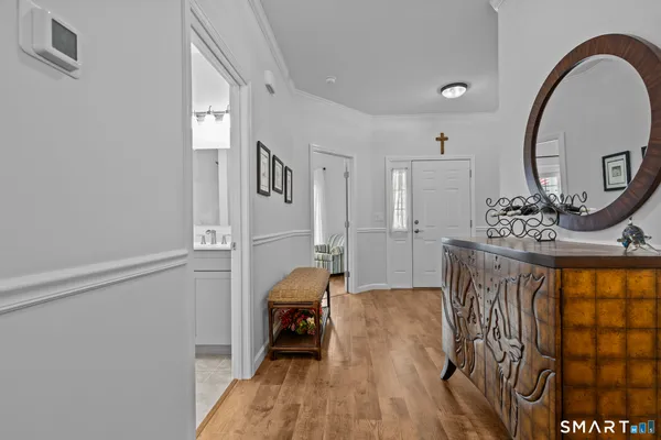 a view of a livingroom with furniture and wooden floor