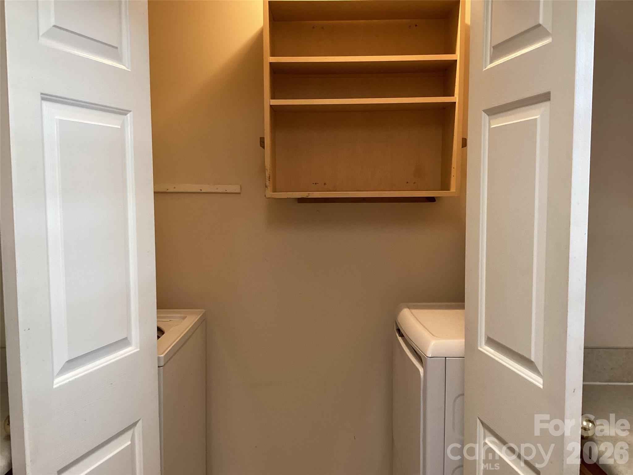 703 Olde Covington Way Arden, NC 28704 - Photo 20 of 23 a bathroom with a refrigerator