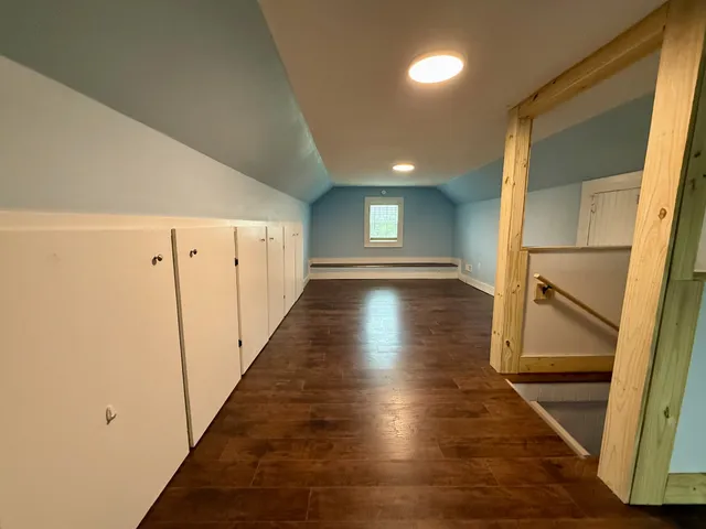 a view of hallway with stairs