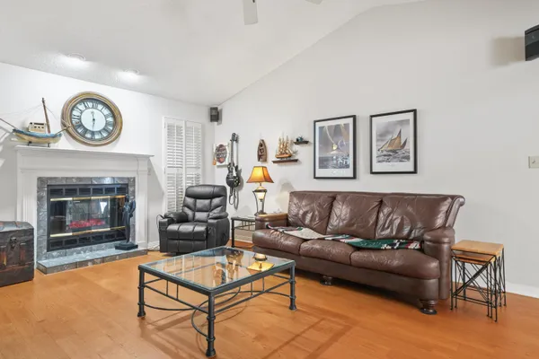 a kitchen with stainless steel appliances granite countertop a sink and cabinets