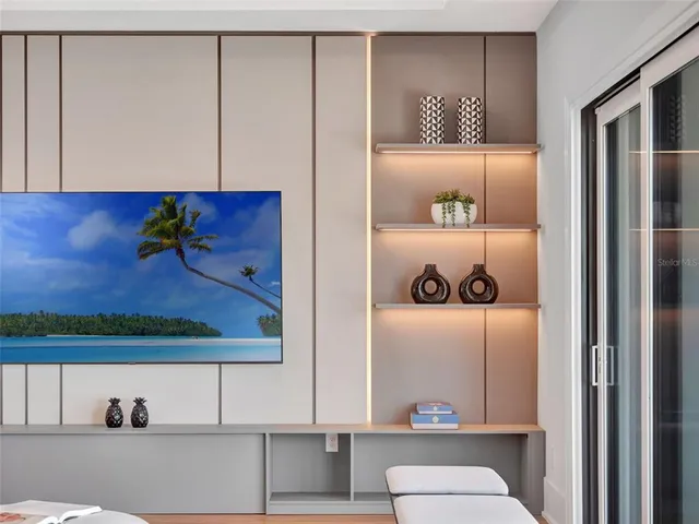 a kitchen with granite countertop a sink and a stove