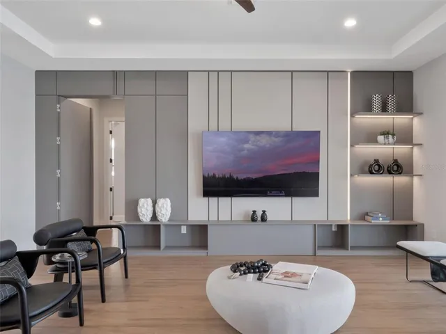 a kitchen with stainless steel appliances a sink stove and cabinets