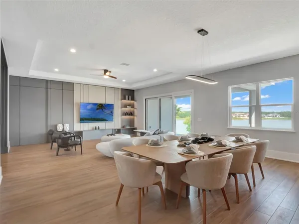a kitchen with stainless steel appliances a sink stove and cabinets