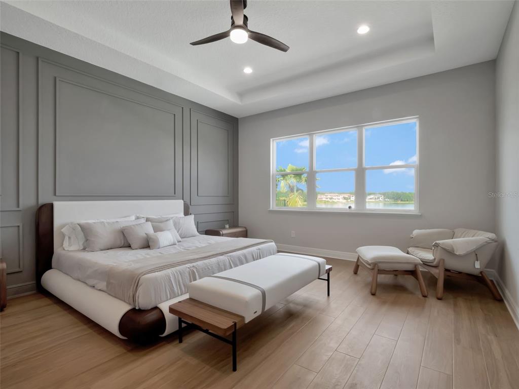 16808 Bolsena Drive Montverde, FL 34756 - Photo 36 of 68 a living room with furniture and a window