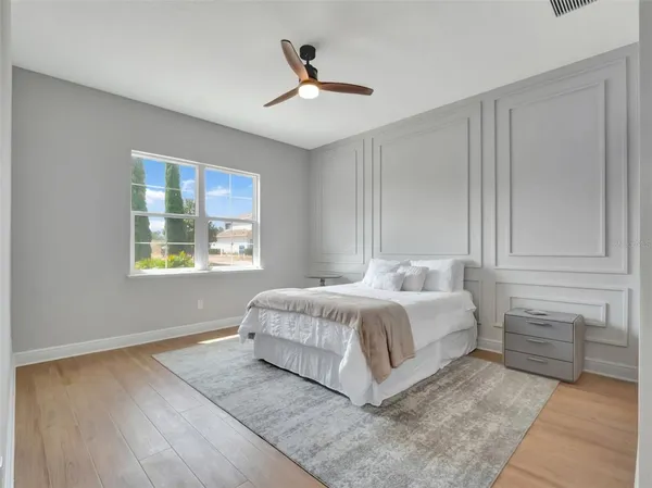 a bedroom with a bed and a closet