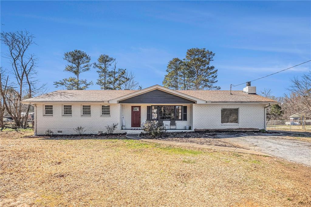 4559 Mason Creek Road Winston, GA 30187 - Photo 1 of 1 a view of a house with a yard