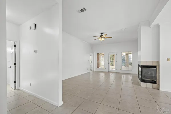 a view of a livingroom and a fireplace