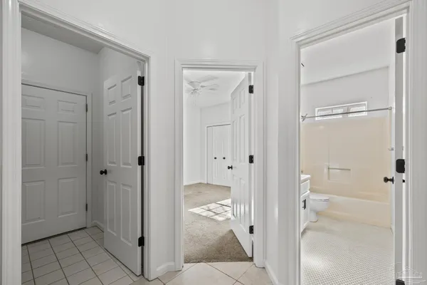 a view of a bathroom with a glass door