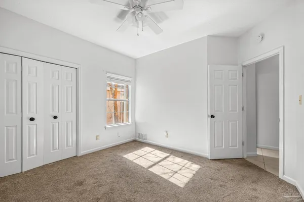 a view of an empty room and window