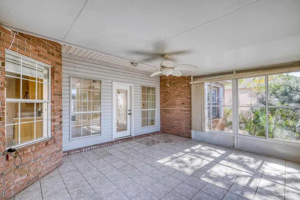 a view of empty room with windows