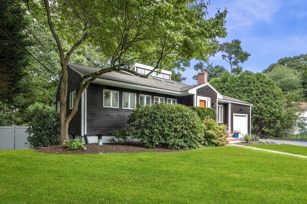 64 Botsford Road Newton, MA 02467 - Photo 3 of 6 front view of house with a yard