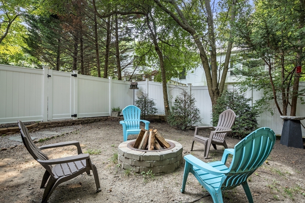 64 Botsford Road Newton, MA 02467 - Photo 6 of 6 a backyard of a house with table and chairs
