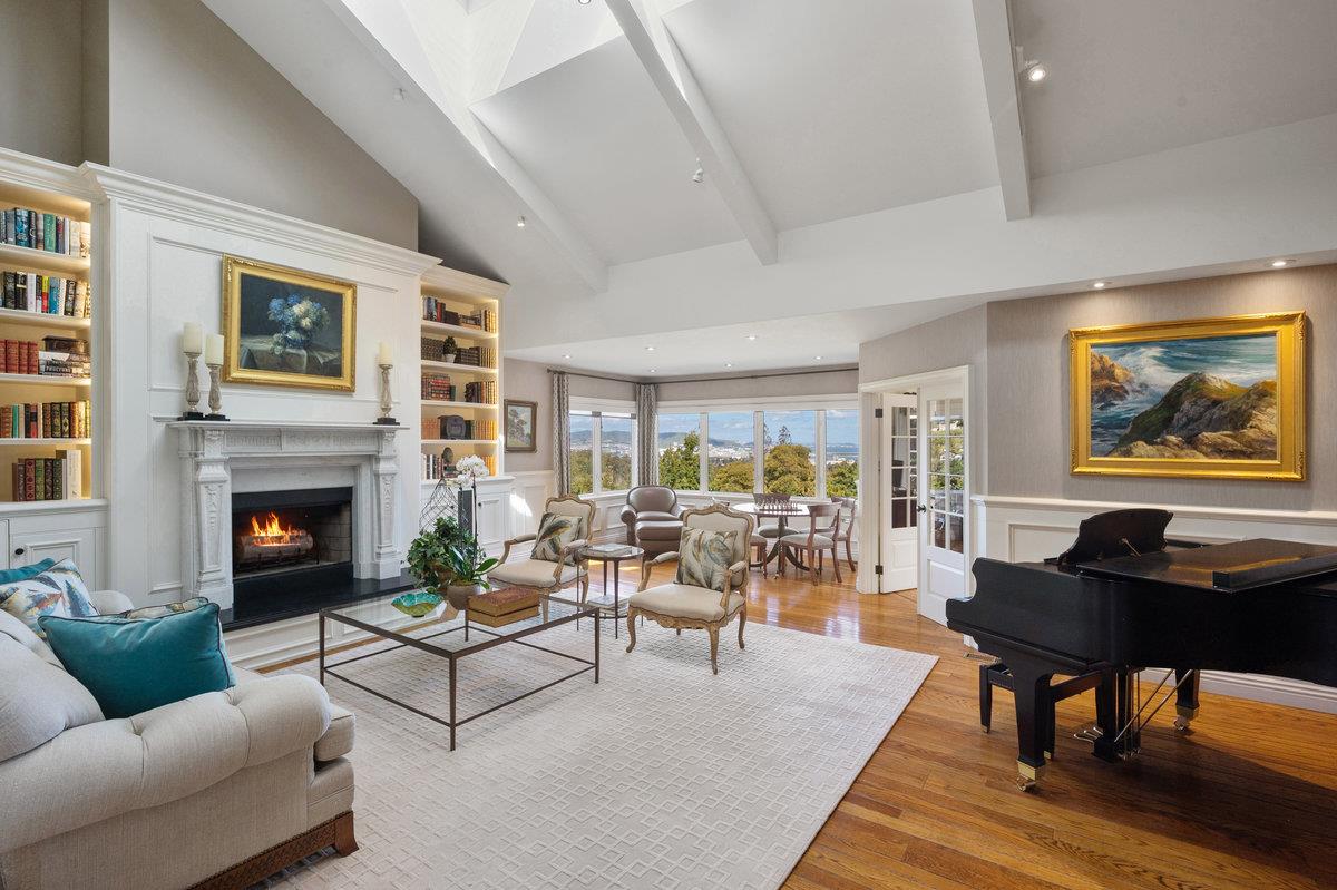 714 Jacaranda Circle Hillsborough, CA 94010 - Photo 13 of 57 a living room with furniture and a fireplace