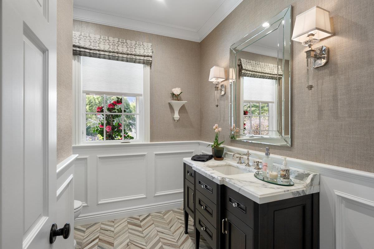 714 Jacaranda Circle Hillsborough, CA 94010 - Photo 16 of 57 a bathroom with a sink and a mirror