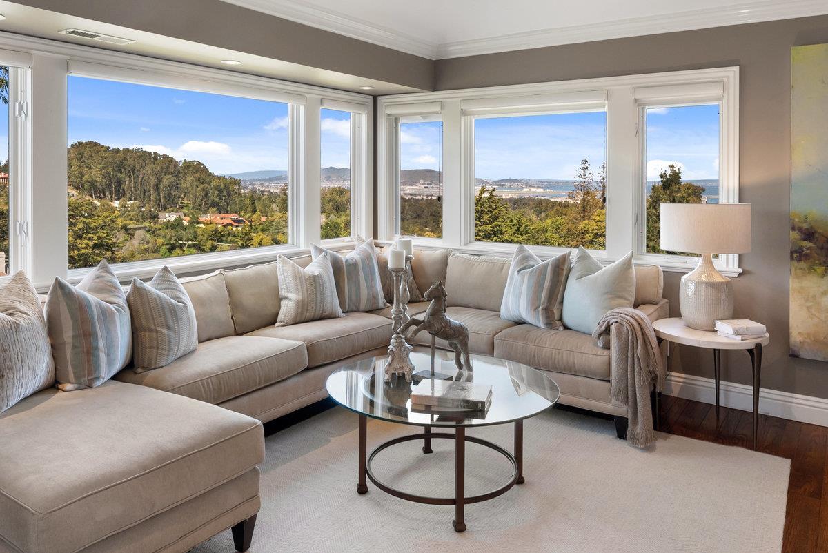 714 Jacaranda Circle Hillsborough, CA 94010 - Photo 19 of 57 a living room with furniture and a large window