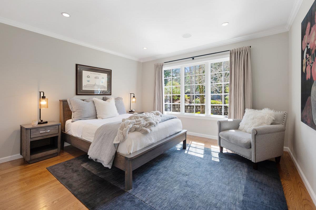 714 Jacaranda Circle Hillsborough, CA 94010 - Photo 26 of 57 a bedroom with a bed and a couch