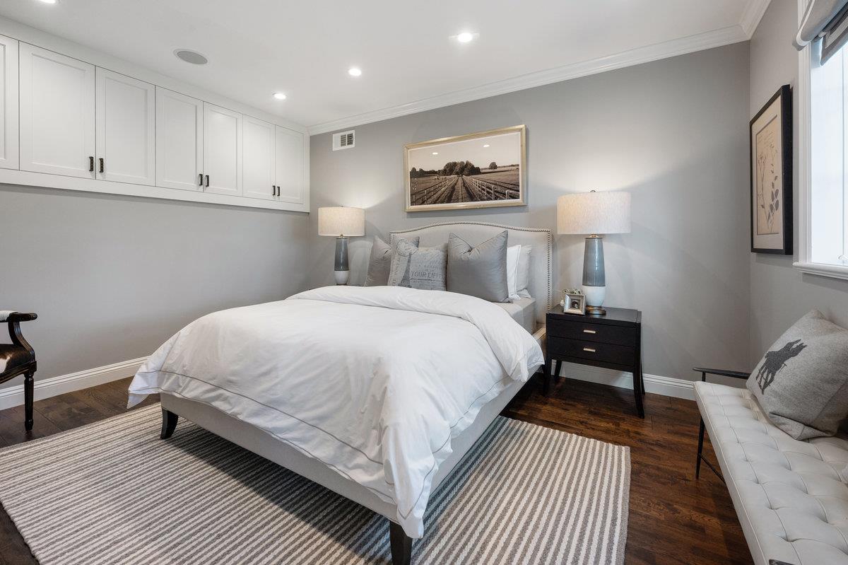 714 Jacaranda Circle Hillsborough, CA 94010 - Photo 35 of 57 a bed room with a bed and a night stand