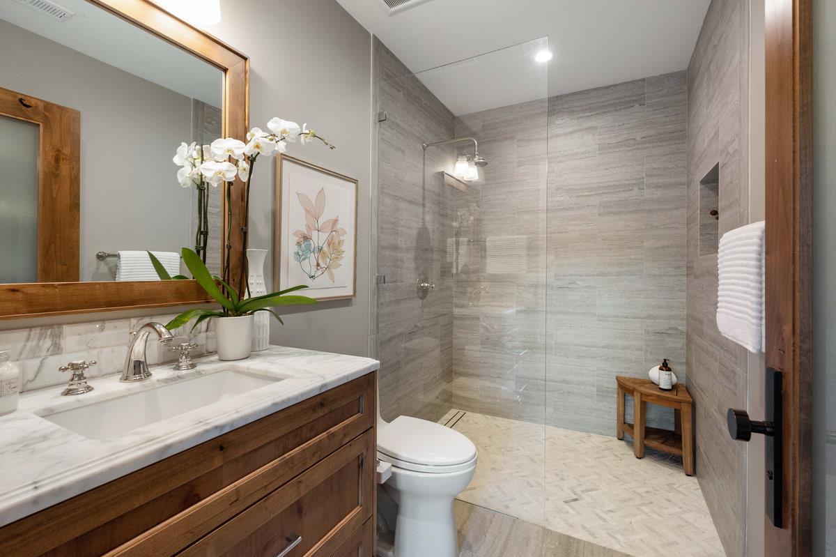 714 Jacaranda Circle Hillsborough, CA 94010 - Photo 36 of 57 a bathroom with a sink a toilet and shower