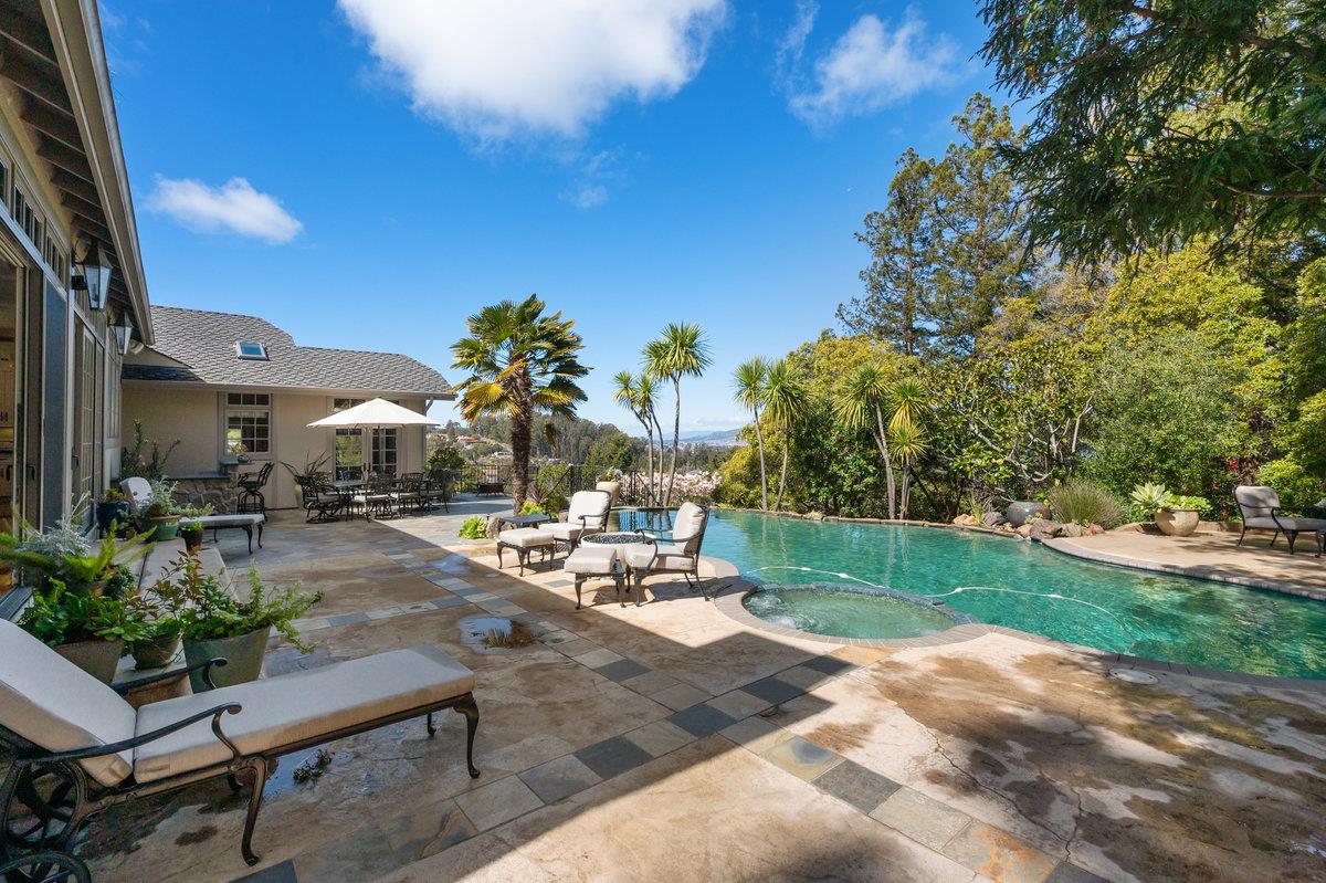714 Jacaranda Circle Hillsborough, CA 94010 - Photo 39 of 57 a view of a backyard with sitting area