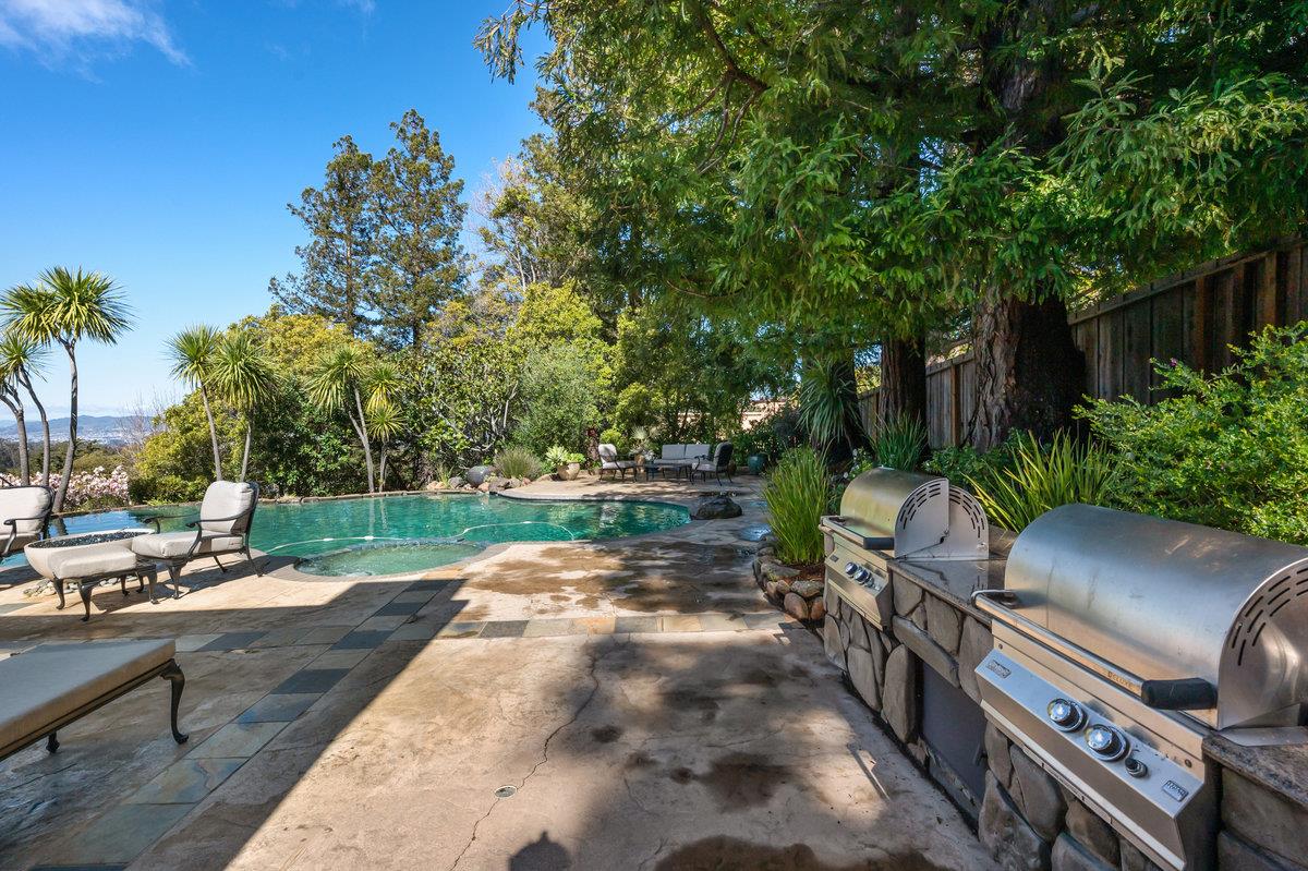 714 Jacaranda Circle Hillsborough, CA 94010 - Photo 40 of 57 a view of a backyard with sitting area