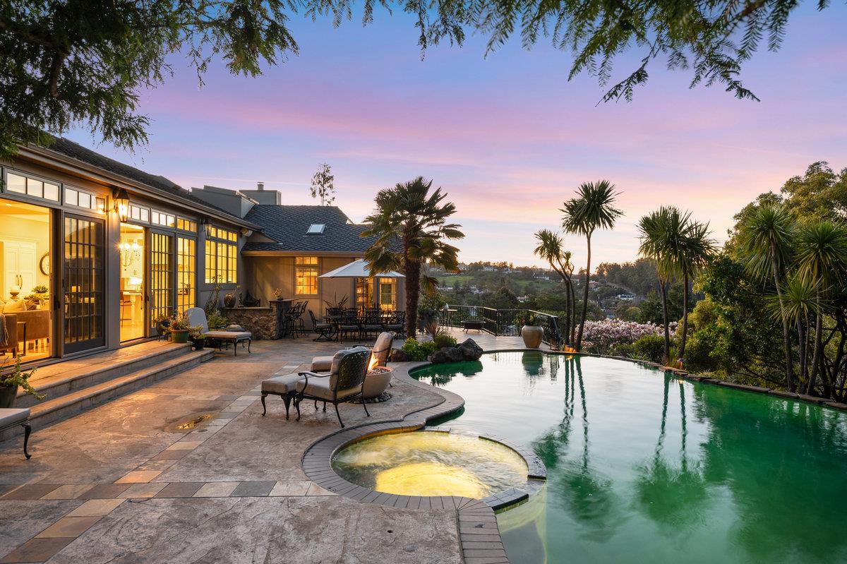 714 Jacaranda Circle Hillsborough, CA 94010 - Photo 48 of 57 a view of a swimming pool with a patio