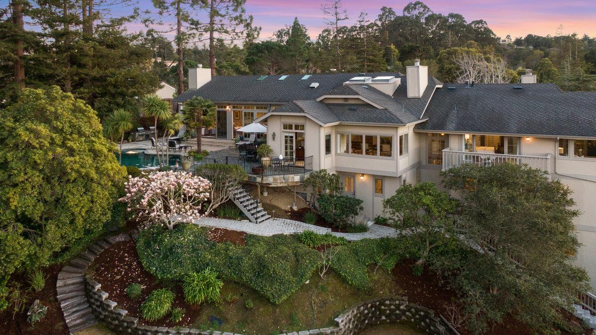 714 Jacaranda Circle Hillsborough, CA 94010 - Photo 53 of 57 a front view of a house with a garden