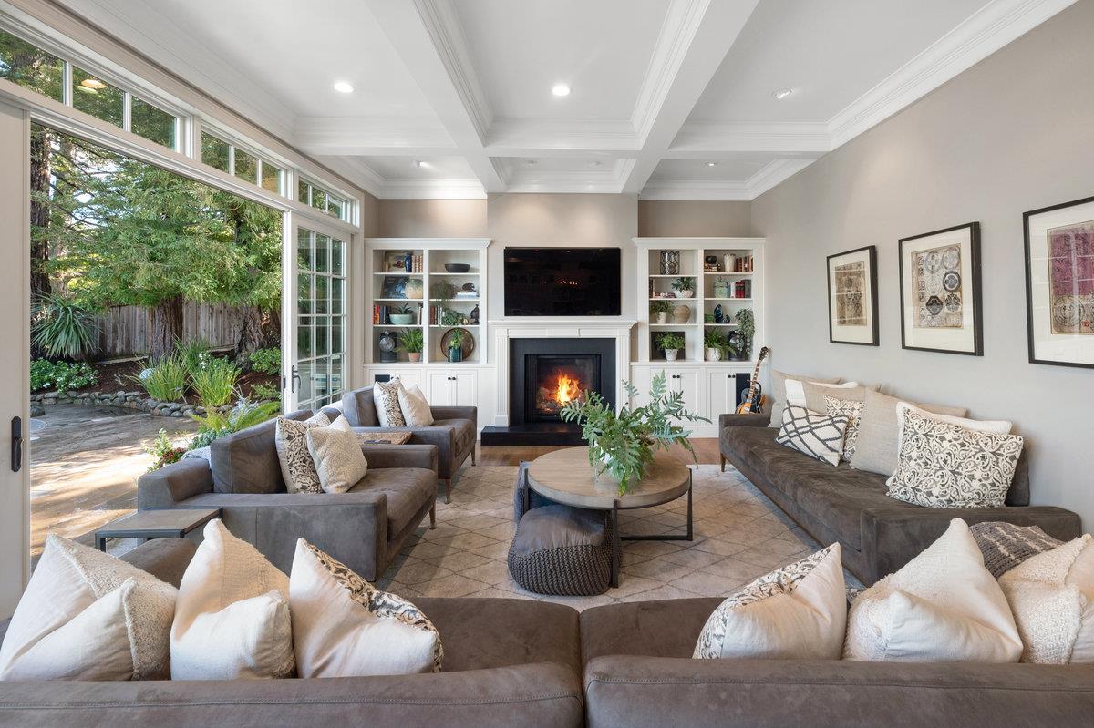 714 Jacaranda Circle Hillsborough, CA 94010 - Photo 10 of 57 a living room with furniture fireplace and large window