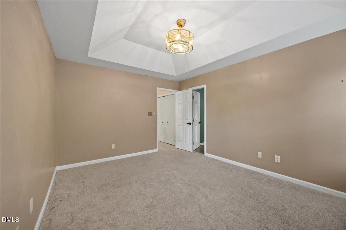 4329 Pine Springs Court Raleigh, NC 27613 - Photo 18 of 35 a view of an empty room