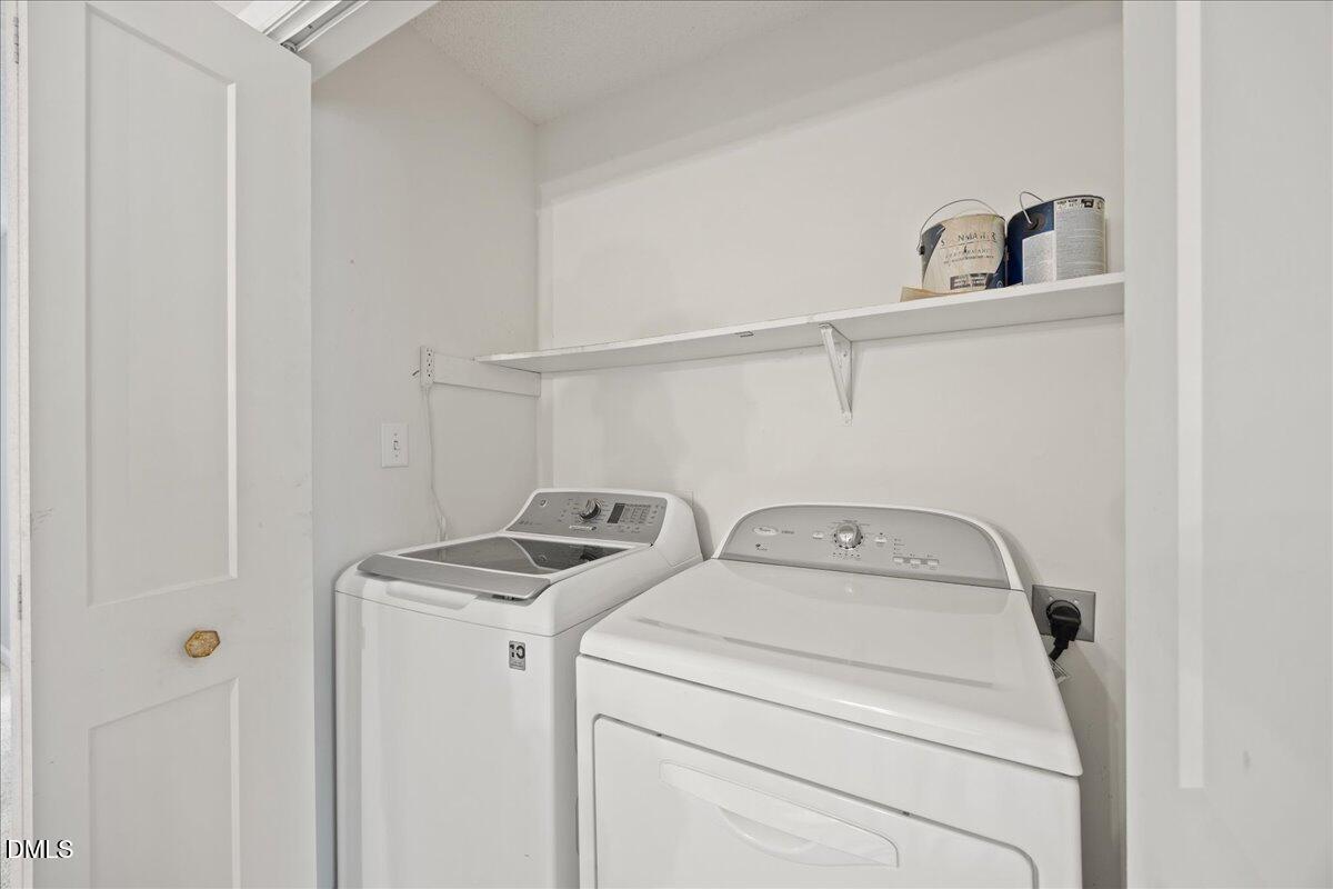 4329 Pine Springs Court Raleigh, NC 27613 - Photo 23 of 35 a utility room with dryer and washer