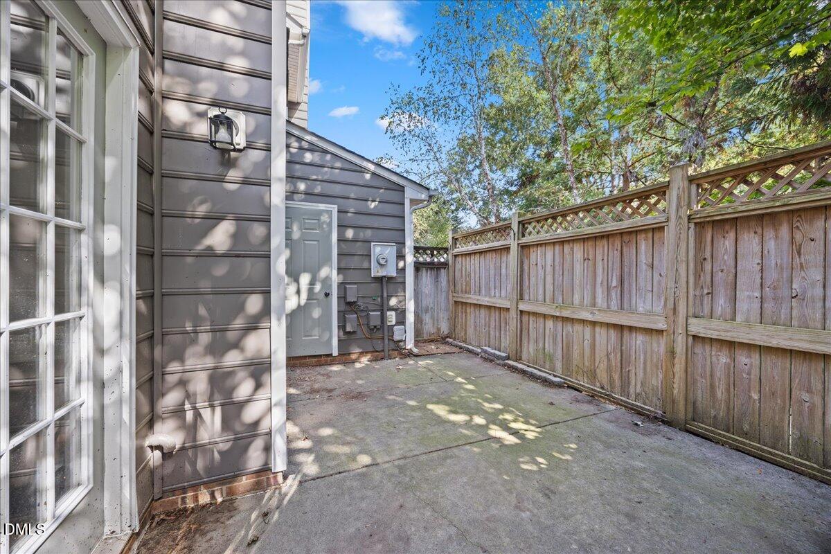 4329 Pine Springs Court Raleigh, NC 27613 - Photo 29 of 35 a view of outdoor space with wooden fence