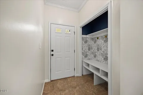 a kitchen with granite countertop a stove a sink and a microwave