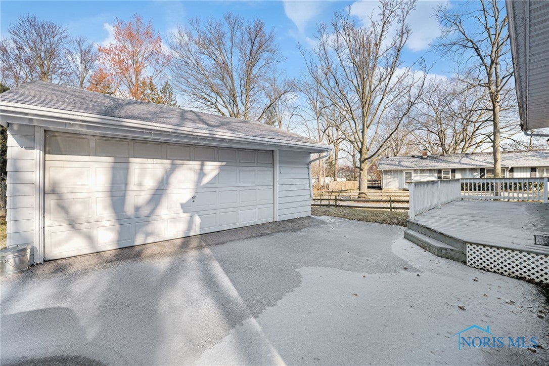 602 Sand Ridge Road Bowling Green, OH 43402 - Photo 20 of 24 Two car garage and deck