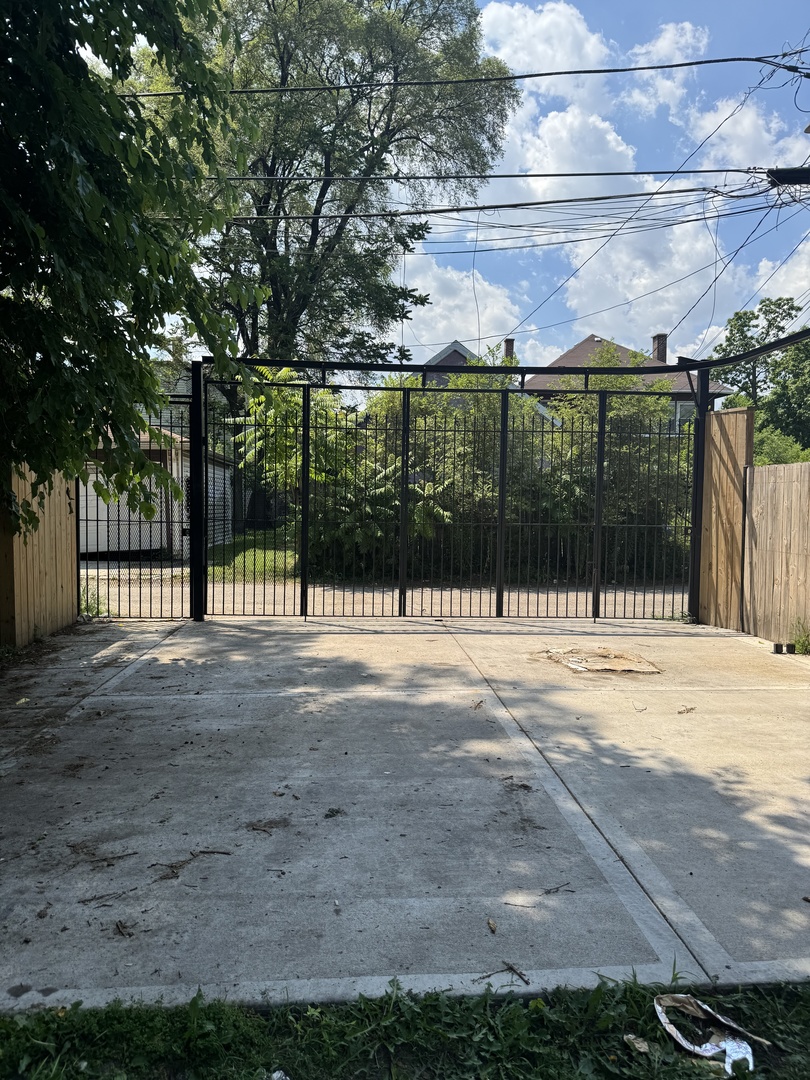 7204 South Union Avenue Chicago, IL 60621 - Photo 12 of 12 a view of a park with iron fence