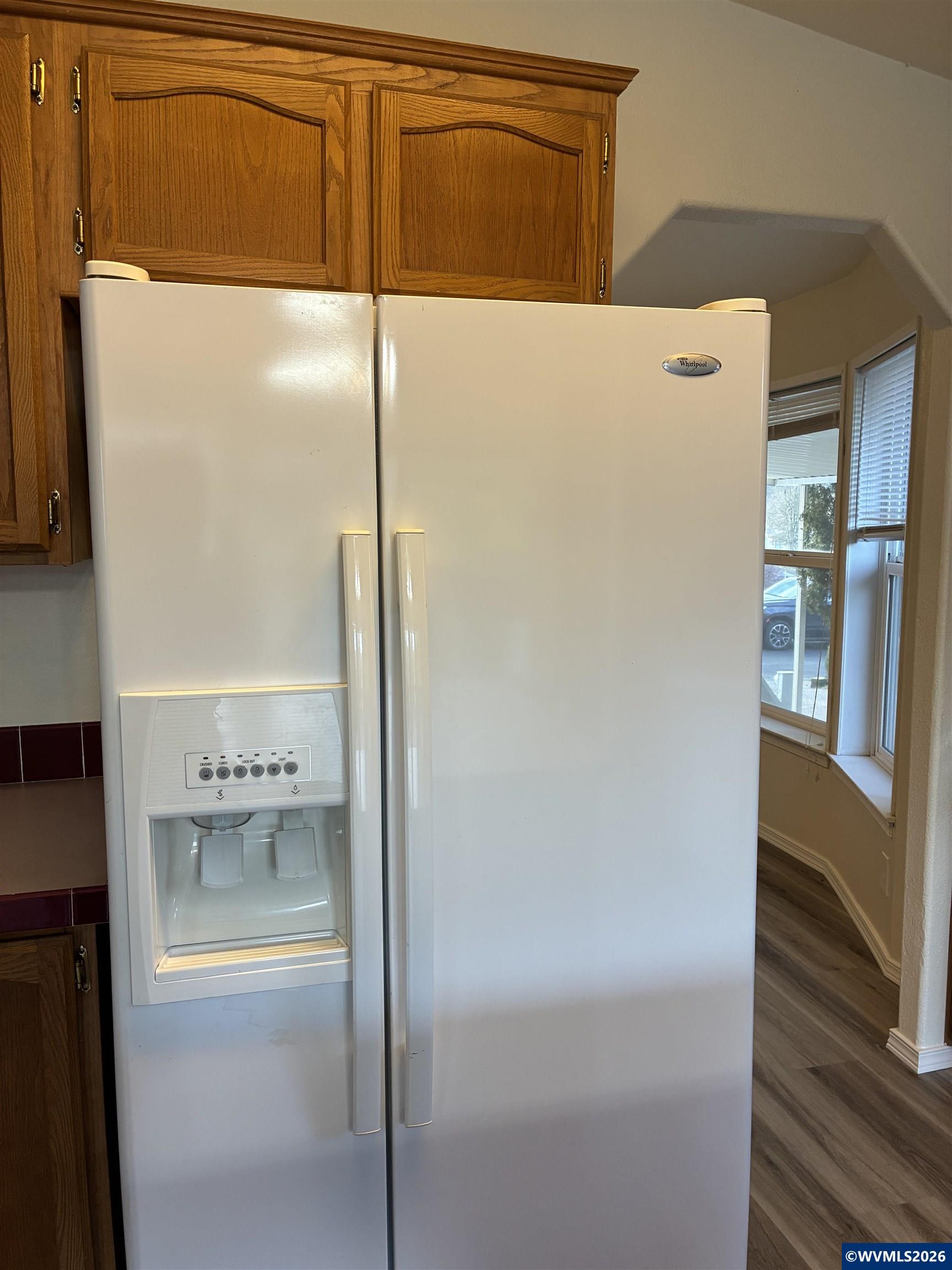 2000 Robins Lane Southeast, Unit 7 Salem, OR 97306 - Photo 10 of 39 a refrigerator freezer sitting inside of a kitchen