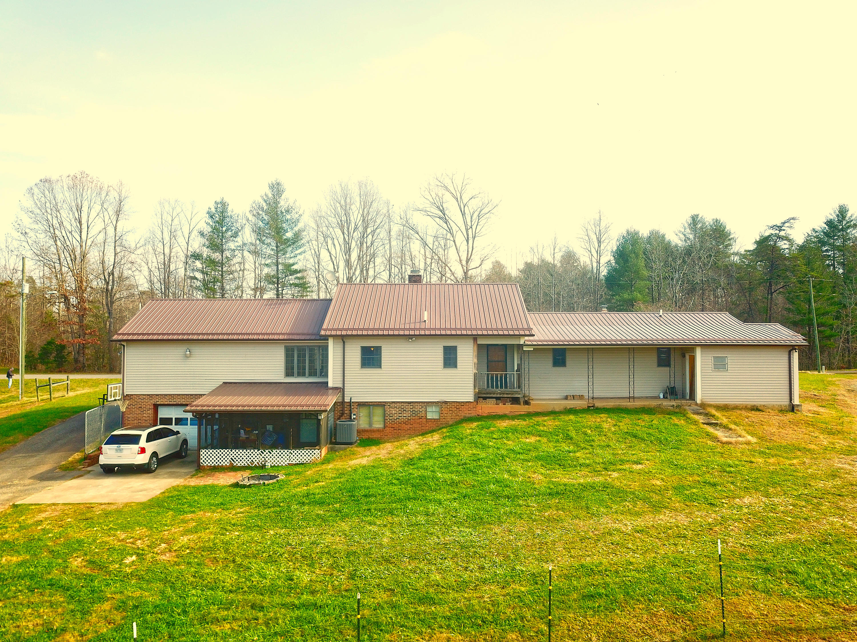 485 Haw Patch Road Ferrum, VA 24088 - Photo 2 of 23 a house view with swimming pool in front of it