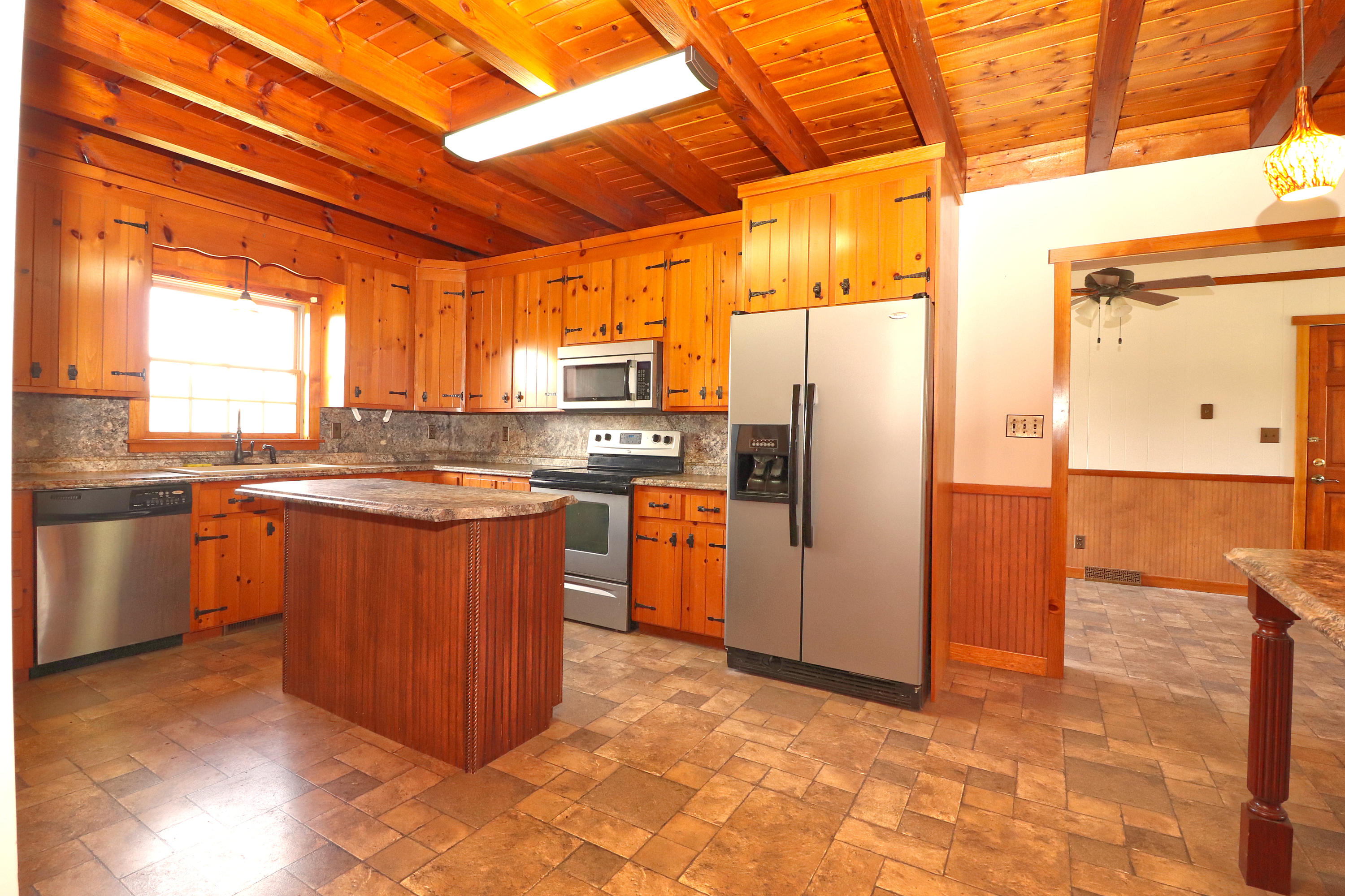 485 Haw Patch Road Ferrum, VA 24088 - Photo 11 of 23 a kitchen with stainless steel appliances granite countertop a refrigerator and a stove