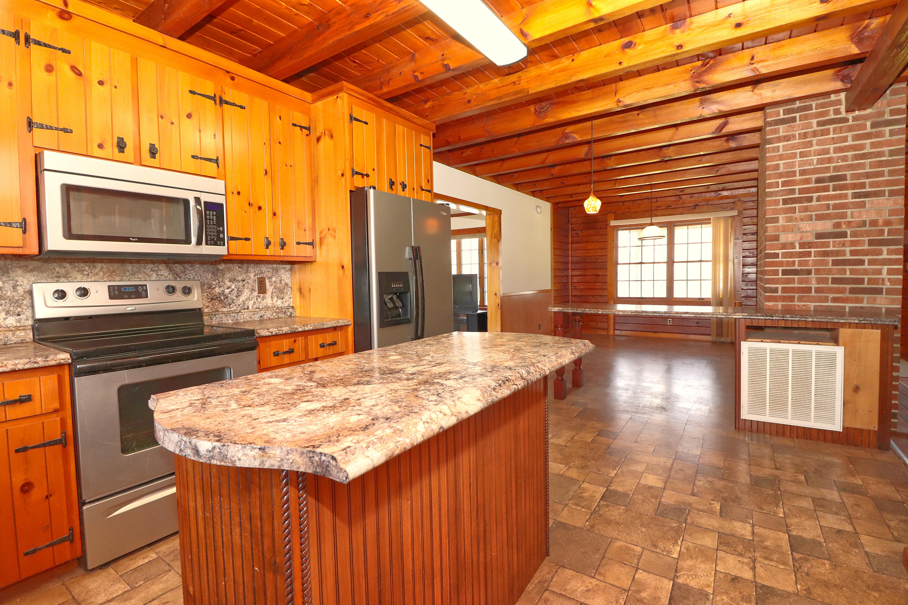 485 Haw Patch Road Ferrum, VA 24088 - Photo 12 of 23 a kitchen with a stove and a microwave
