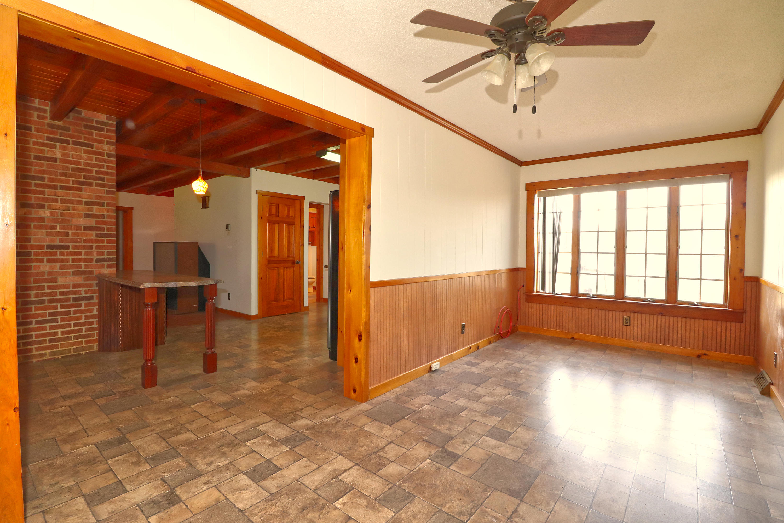 485 Haw Patch Road Ferrum, VA 24088 - Photo 13 of 23 a view of empty room with wooden floor and fan